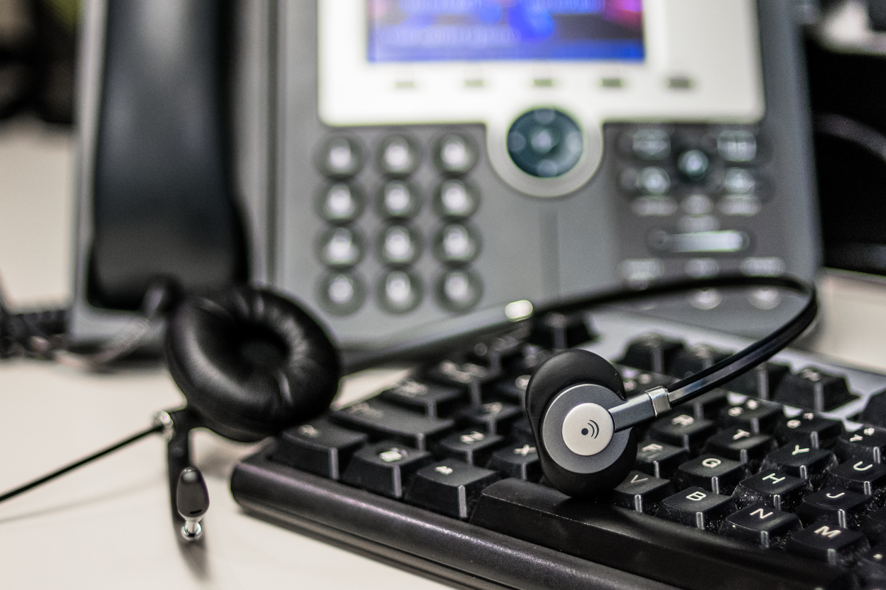 Desk phone and computer keyboard